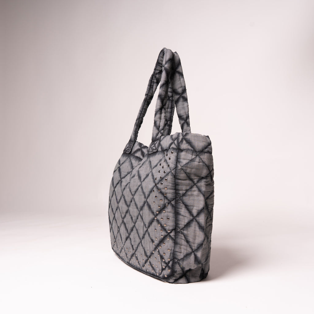 Bolso Tacha